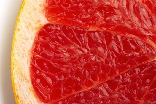 The cut of red grapefruit. Macro