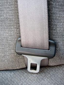 Picture of close ups of seat belts and other safety and restraining devices in cars
