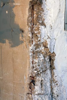 Structure of the old weathered scratched concrete wall