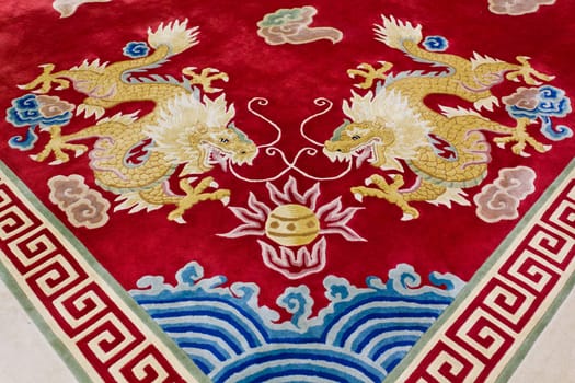 Dragon image on the carpet in chinese temple, Thailand.