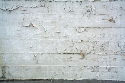 Structure of the old weathered scratched concrete wall