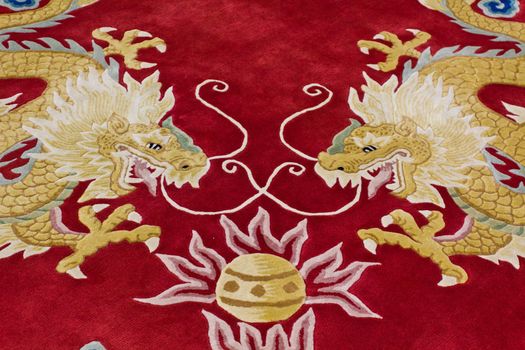 Dragon image on the carpet in chinese temple, Thailand.