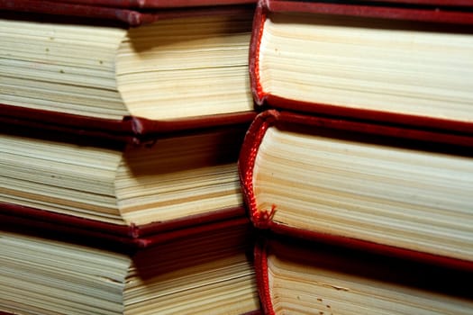 Old books in darkly red covers