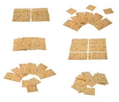 Six groups of crackers isolated over white background.