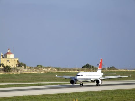 Civil aircraft landing at an airfield in Malta