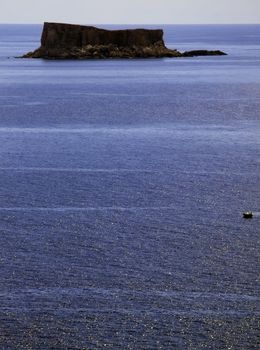 Small uninhabited rocky island off the southern coast of Malta called Filfla. Was used for target practice during WWII. Once had a chapel, which was destroyed during seismic activity. 