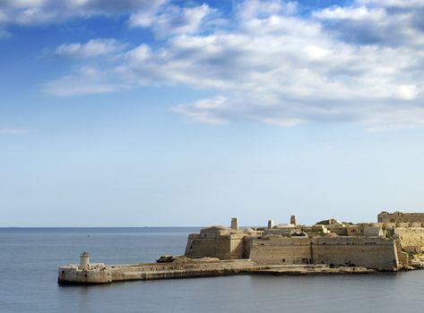 Entrance to the famous Grand Harbour in Malta, surrounded by medieval bastions and gun turrets