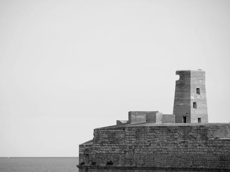 Entrance to the famous Grand Harbour in Malta, surrounded by medieval bastions and gun turrets