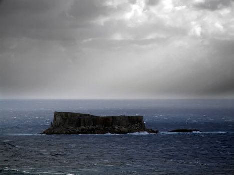 Small uninhabited rocky island off the southern coast of Malta called Filfla. Was used for target practice during WWII. Once had a chapel, which was destroyed during seismic activity. 