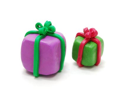 Two 3D Colored Christmas Gifts Made of Plasticine Isolated on White Background