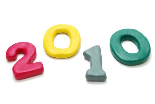 3D New Year Text 2010 Laying Random Made of Colored Plasticine Isolated on White Background