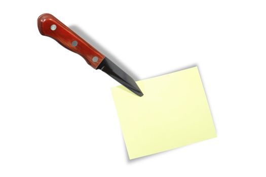 Yellow paper for your messages attach with knife. Isolated on white background with clipping path