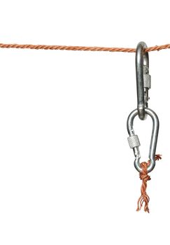 Two connected carabiners hanging on the disrupt rope. Isolated on white with clipping path
