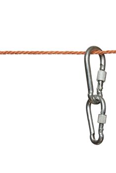 Two connected carabiners hanging on the rope. Isolated on white with clipping path