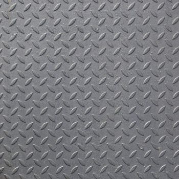 Diamond steel plate useful as a background