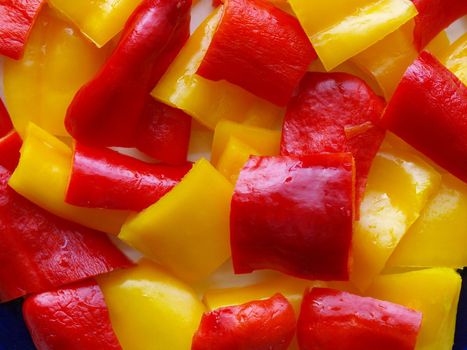 Red and yellow peppers useful as a food background