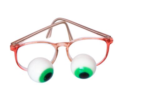 Funny composition with two big toy eyes and spectacles. Isolated on white with clipping path