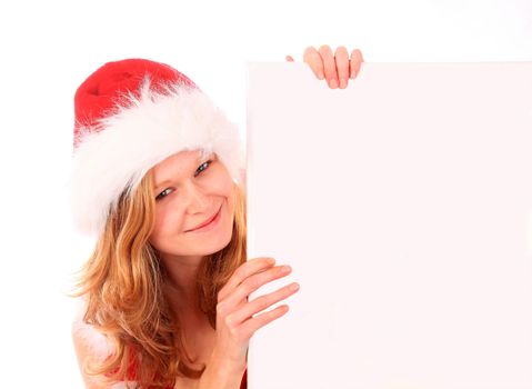 miss santa is smiling and holding the part of a blank poster