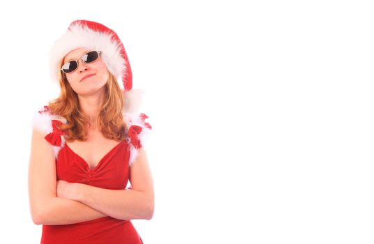 Miss Santa is wearing sunglasses and folding her arms for a cool look - rectangle crop for additional whitespace