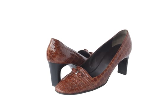 Pair of nice brown woman's shoes isolated with clipping path