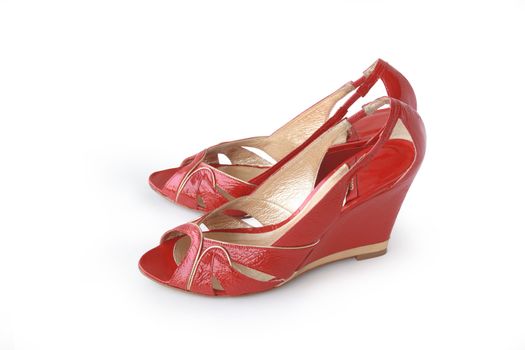 Pair of nice red woman's shoes isolated with clipping path