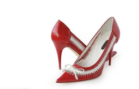 Pair of nice red woman's shoes isolated with clipping path