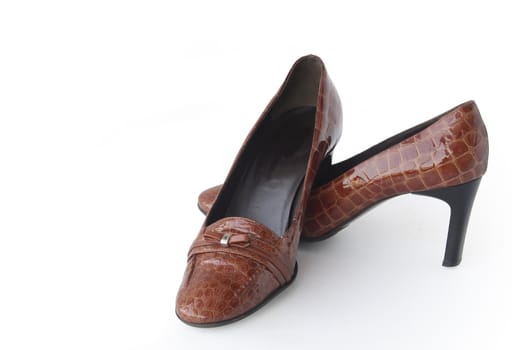 Pair of nice brown woman's shoes isolated with clipping path