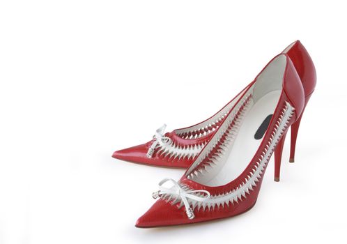 Pair of nice red woman's shoes isolated with clipping path