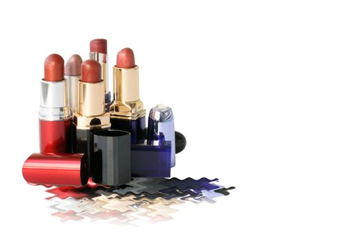 Closeup of various lipsticks on white background isolated with clipping path