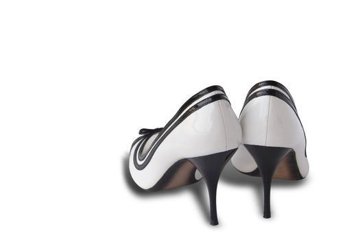 Pair of nice white woman's shoes isolated with clipping path