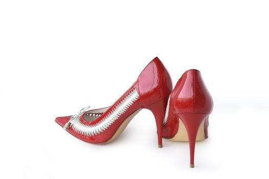 Pair of nice red woman's shoes isolated with clipping path