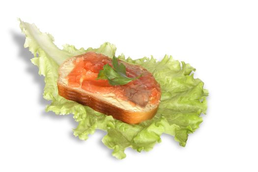 Sandwich with butter and fish lying on lettuce leaf. Isolated on white with clipping path