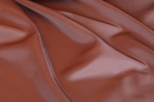 Background made from nice smooth brown textile