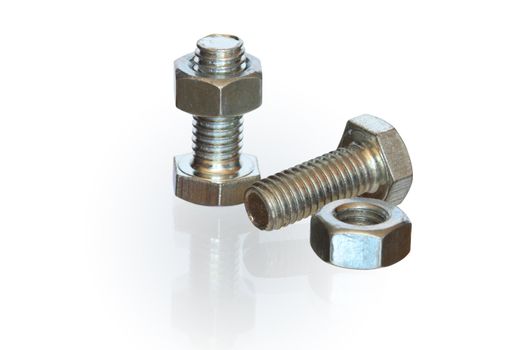 Metal bolts and screw nuts isolated on white background with clipping path