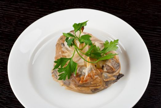 Tasty mushroom mix with cheese and cream wrapped at rice paper packet