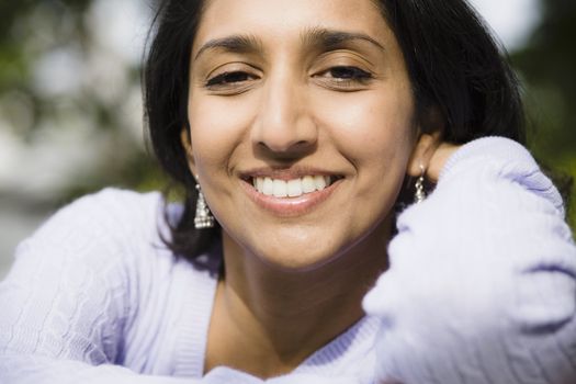 Portrait of a Smiling Indian Woman Outdoors