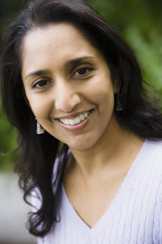 Portrait of a Smiling Indian Woman Outdoors