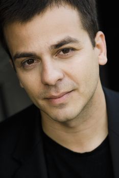 Portrait of a Serious Indian Male Looking Directly To Camera