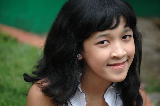 little asian girl with nice smile expression