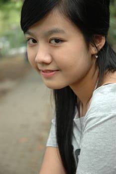 young asian lady with nice smile expression