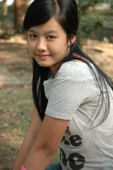 young asian lady with nice smile expression