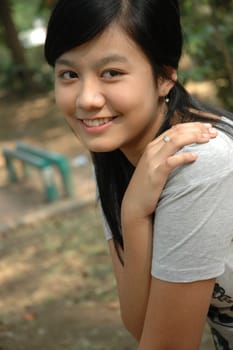 young asian lady with nice smile expression