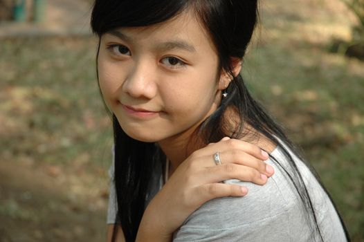 young asian lady with nice smile expression