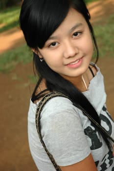 young asian lady with nice smile expression