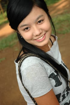 young asian lady with nice smile expression