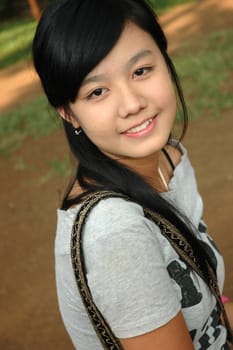 young asian lady with nice smile expression