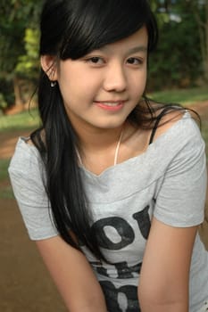 young asian lady with nice smile expression