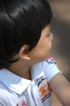 little boy with nice and cute face expression