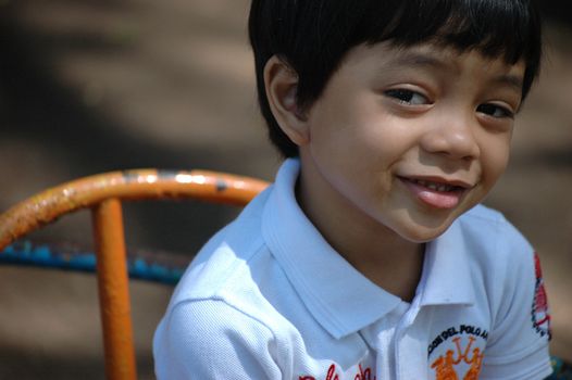 little boy with nice and cute face expression