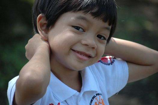 little boy with nice and cute face expression